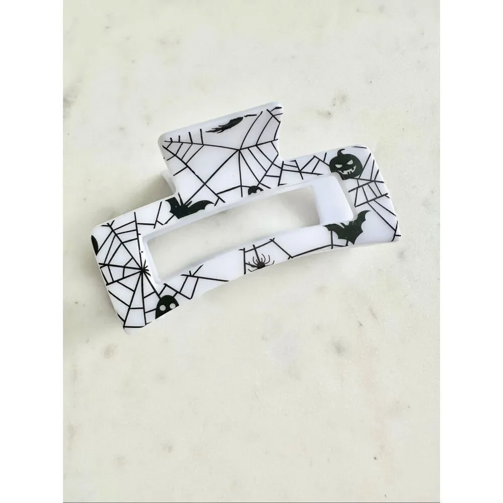 Black and white spiderweb & bat hair claw